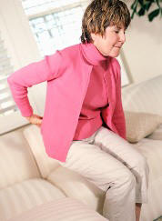 backpain-woman-couch lower back pain
